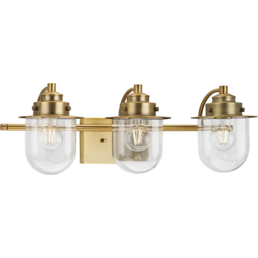 Northlake Collection Three-Light Vintage Brass Clear Glass Transitional Bath Light